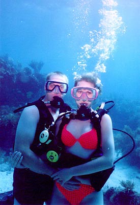 Couples scuba diving